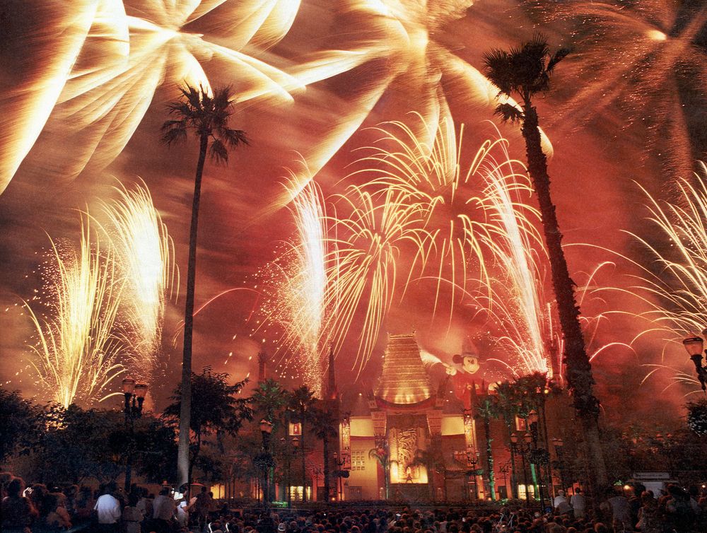 Fireworks filling the sky above the studio backlot during Sorcery in the Sky